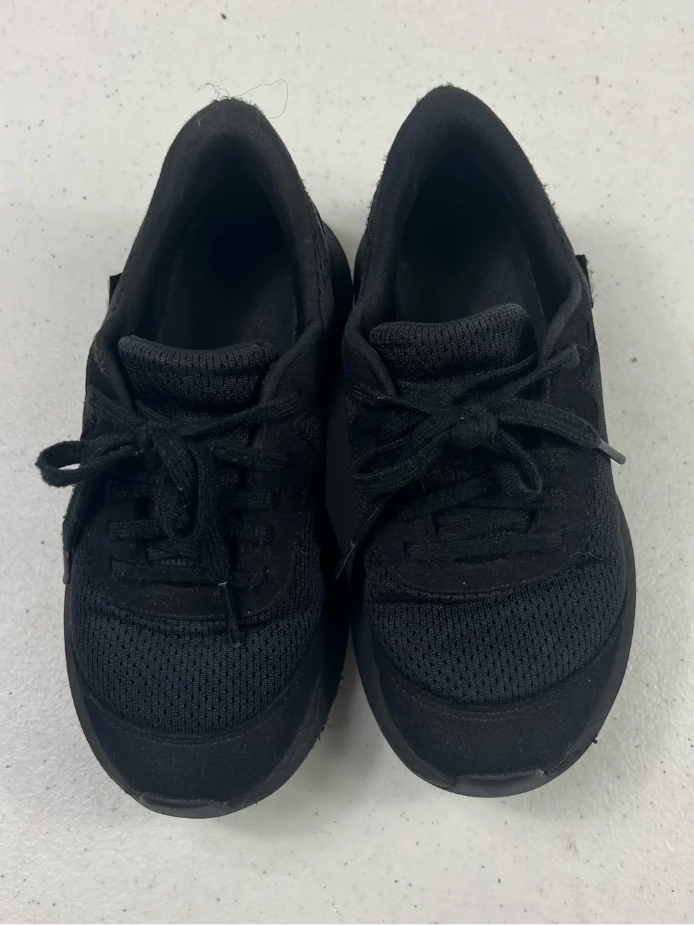 Kizik Kids All-Black Slip-On Athletic Shoe
